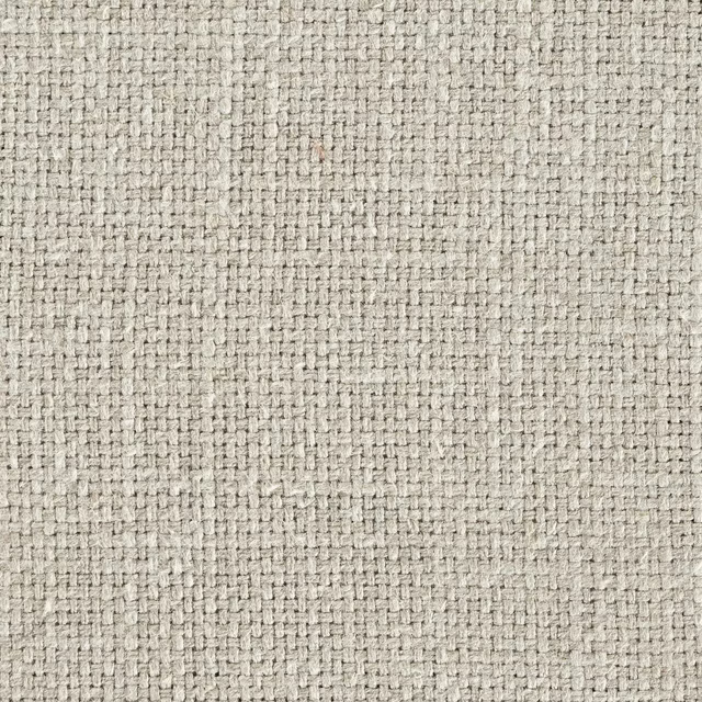 Close-up of warm pebble beige woven fabric with tight textured slub