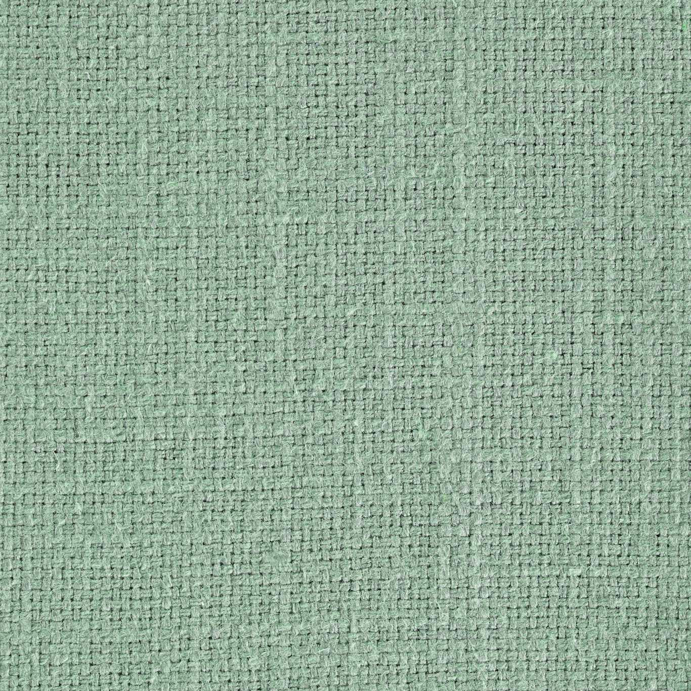 Close-up of soft seafoam green woven fabric with a tight nubby texture