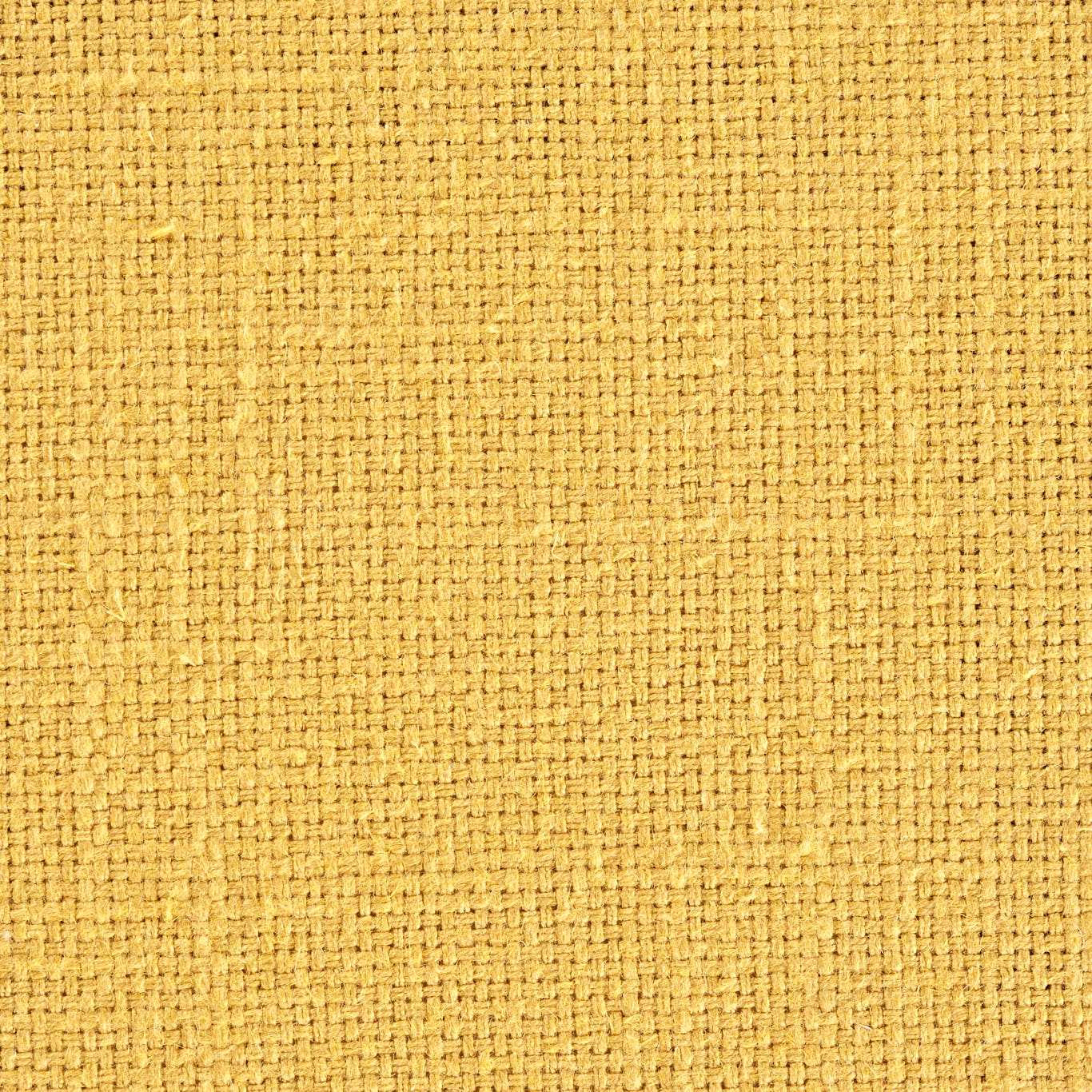 Close-up of a warm sunflower yellow woven fabric with a textured basket weave