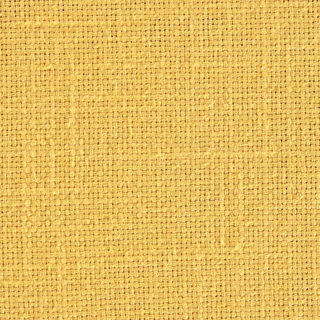Close-up of a warm sunflower yellow woven fabric with a textured basket weave