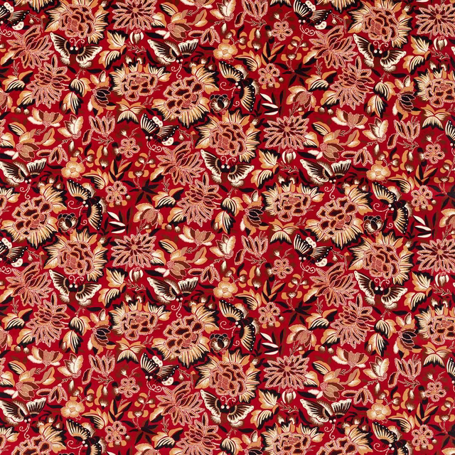 Dense floral and butterfly fabric in cinnabar red, cream and ink black