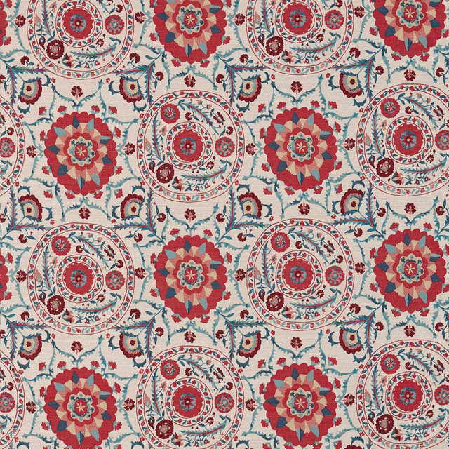 Coral red and indigo floral medallions on an ivory woven fabric