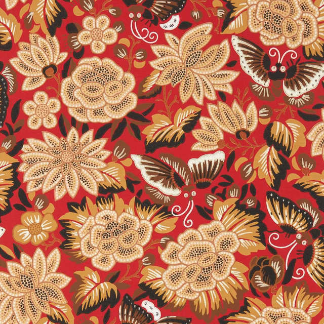 Cinnabar-red wallpaper with cream florals, ink-black butterflies and ochre botanical accents