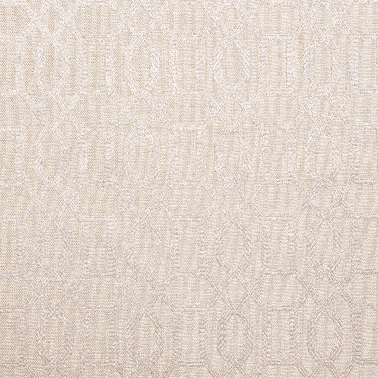 Champagne fabric with softly raised interlocking geometric outlines in ivory tones