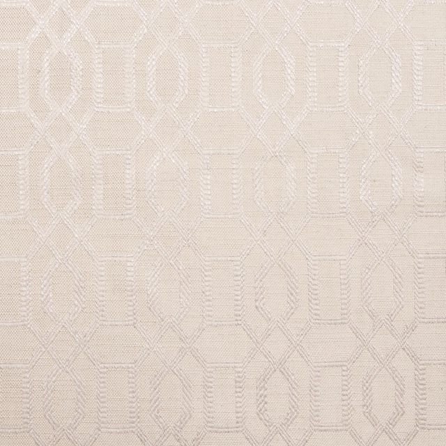 Champagne fabric with softly raised interlocking geometric outlines in ivory tones