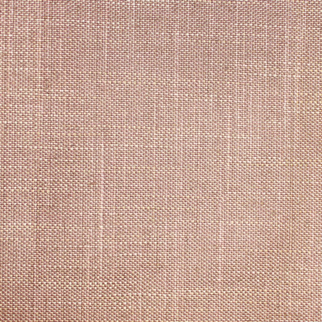 Dusty blush pink fabric with a fine, tightly woven crosshatch texture