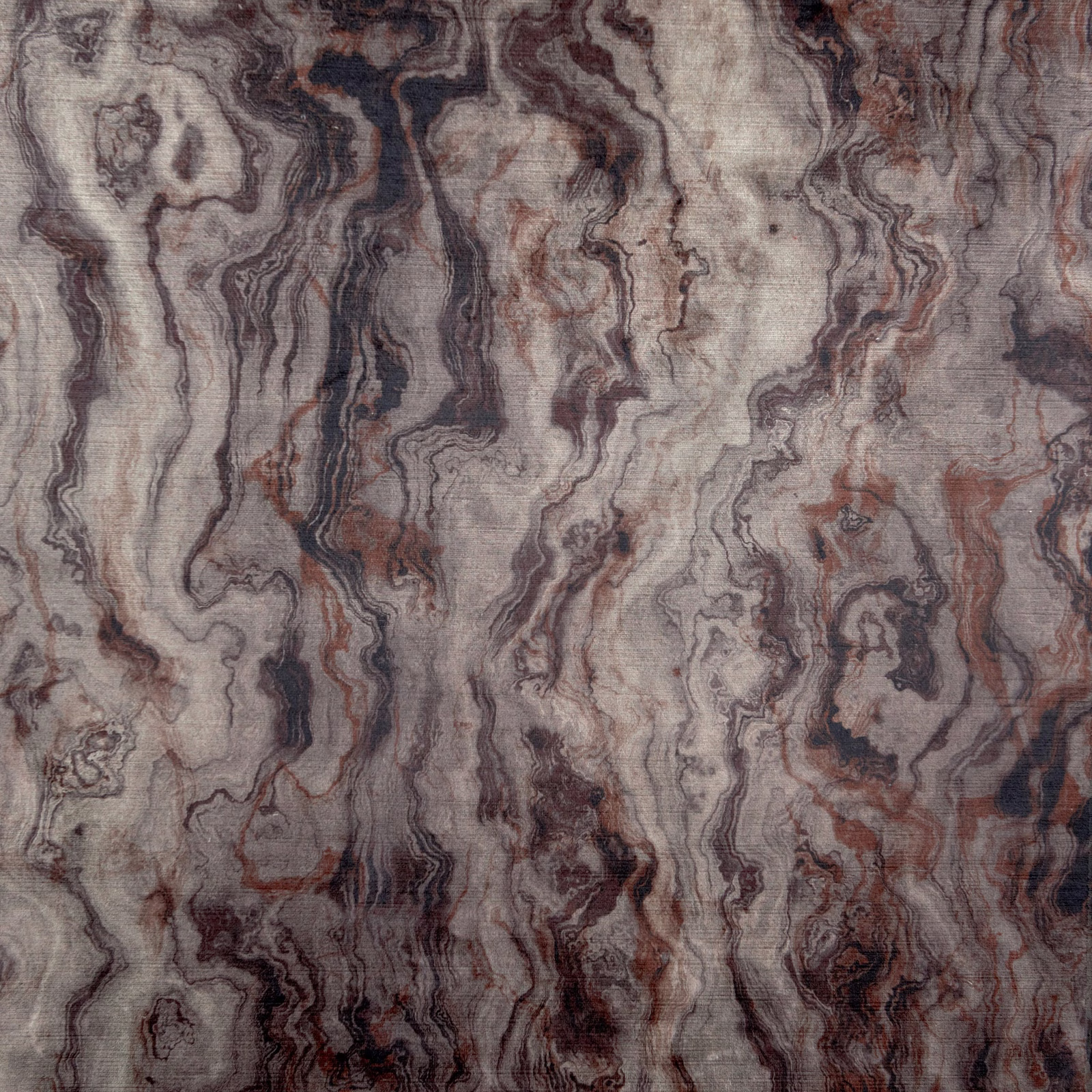 Smoky grey marble-effect textile with charcoal veins, taupe ribbons and muted rust accents