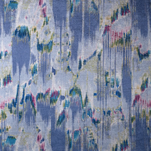 Misty blue woven textile with painterly turquoise, green and pink vertical marks