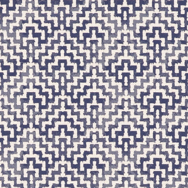 Navy and ivory woven fabric with repeating stepped geometric motifs