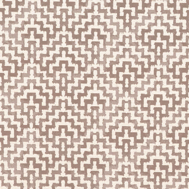 Warm taupe and ivory woven textile with dense stepped geometric motifs
