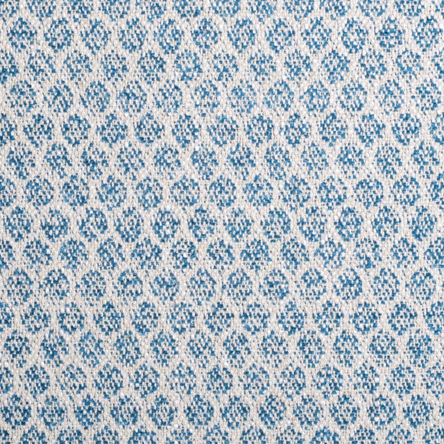 Cool blue and cream woven textile with a small irregular flecked motif