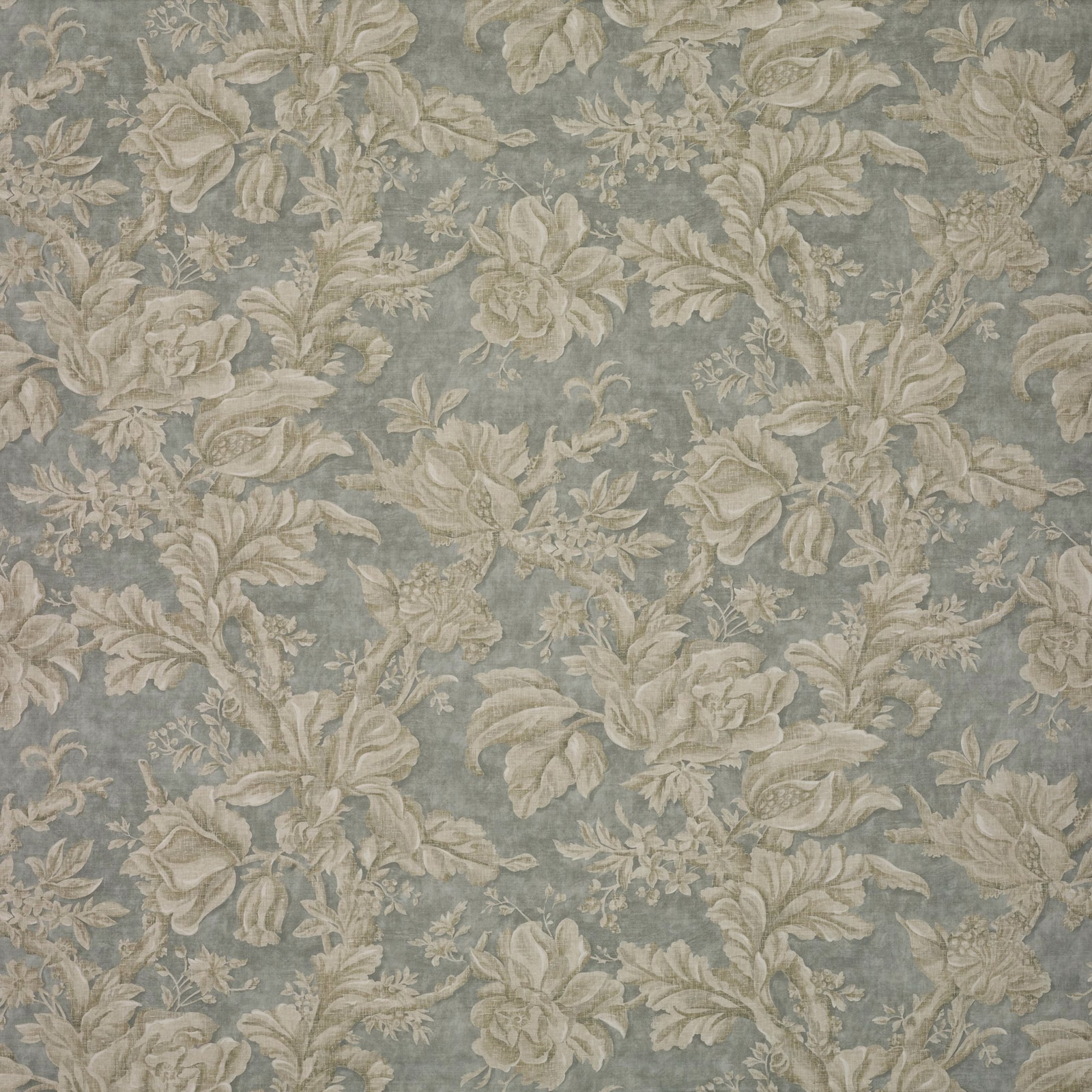 Muted blue-grey floral textile with ivory leaves and soft beige blossoms
