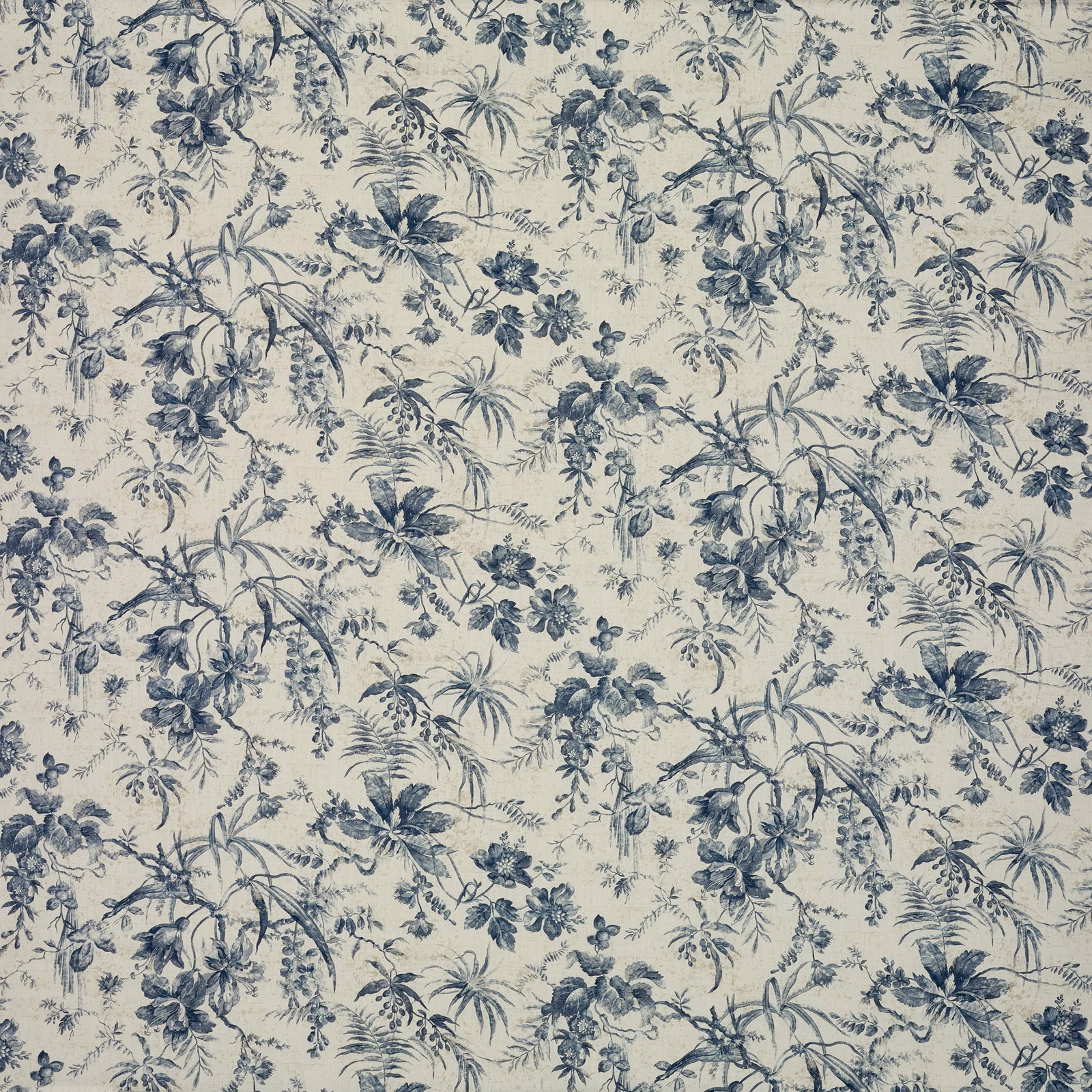 Cream fabric with dense blue-grey floral branches, palms and scattered botanical sprigs