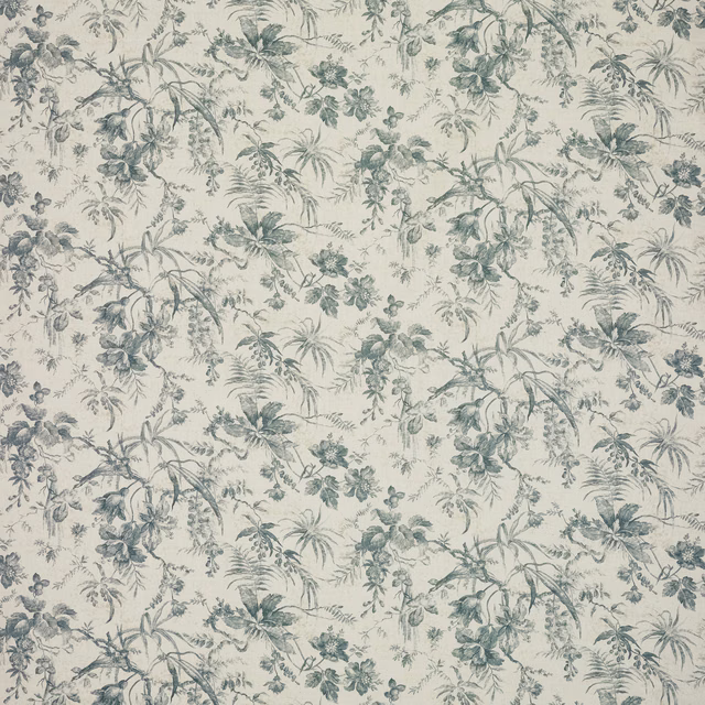 Muted blue-grey botanical branches and palm-like leaves scattered across a warm cream ground