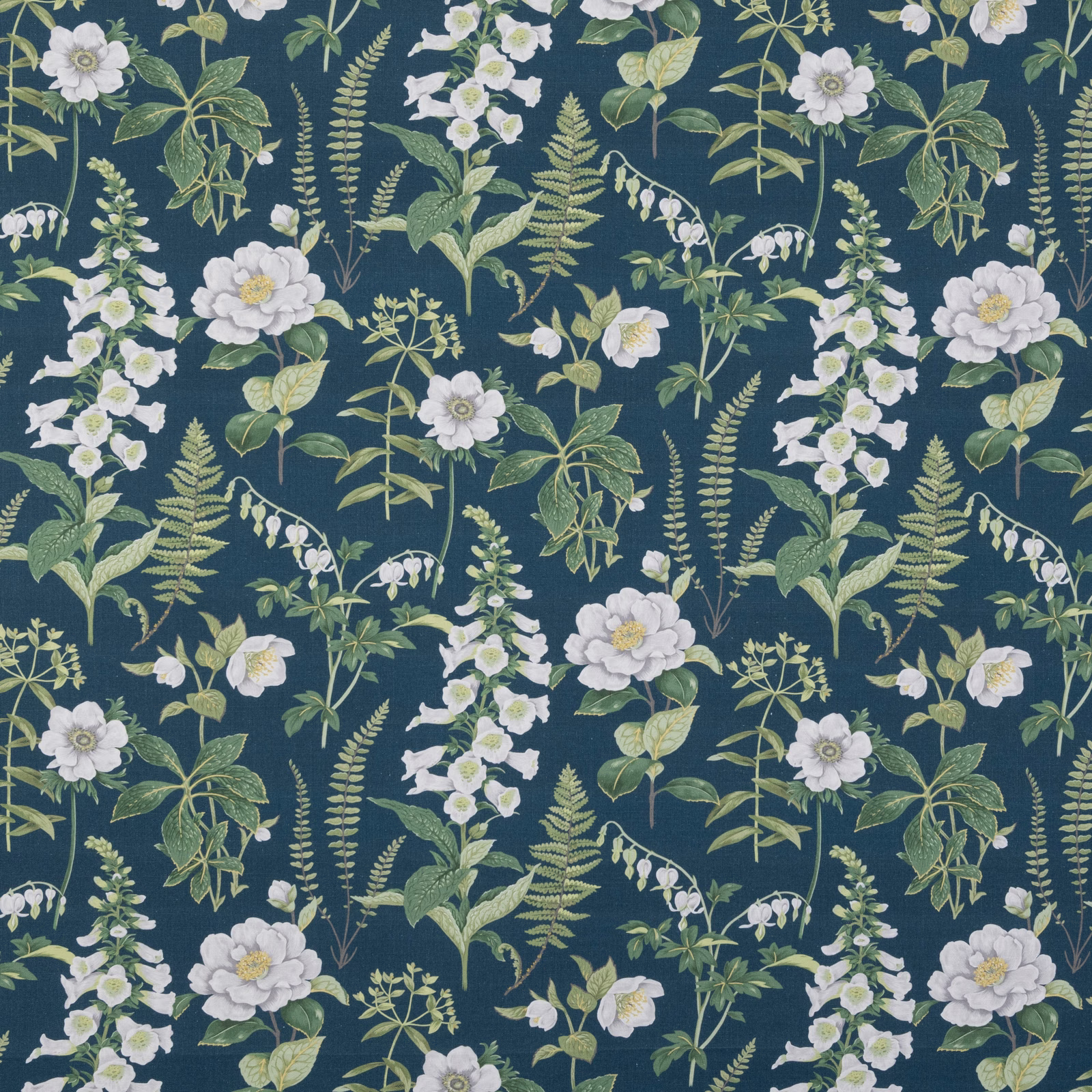 Deep navy floral fabric with white blossoms, sage leaves and fern sprays