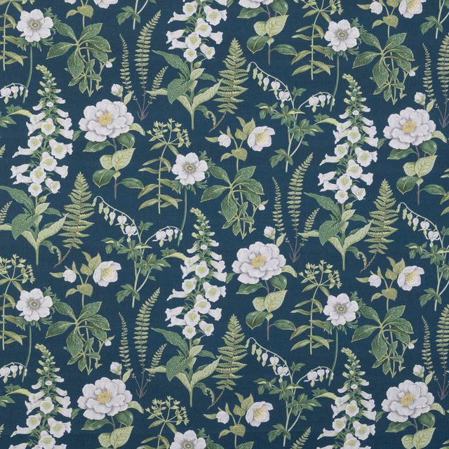 Deep navy floral fabric with white blossoms, sage leaves and fern sprays