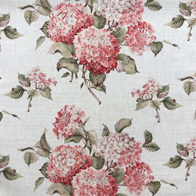 Pale blue-grey floral fabric with pink hydrangea clusters and muted green leaves