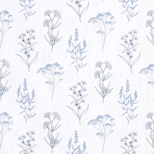 White botanical fabric with powder-blue sprigs, fine stems and delicate berry clusters