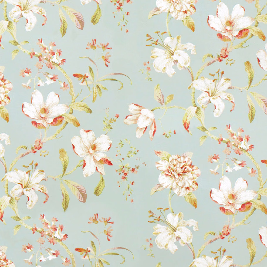 Pale blue floral print with ivory blooms, coral accents and trailing green leaves
