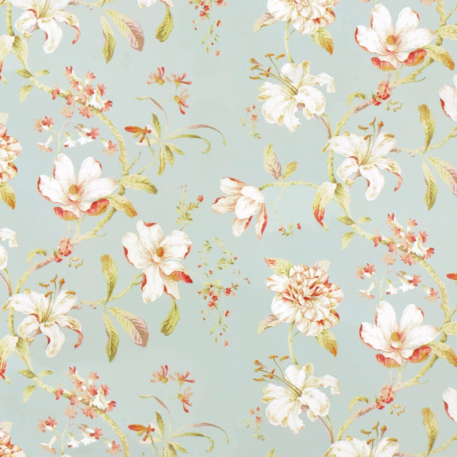 Pale blue floral print with ivory blooms, coral accents and trailing green leaves