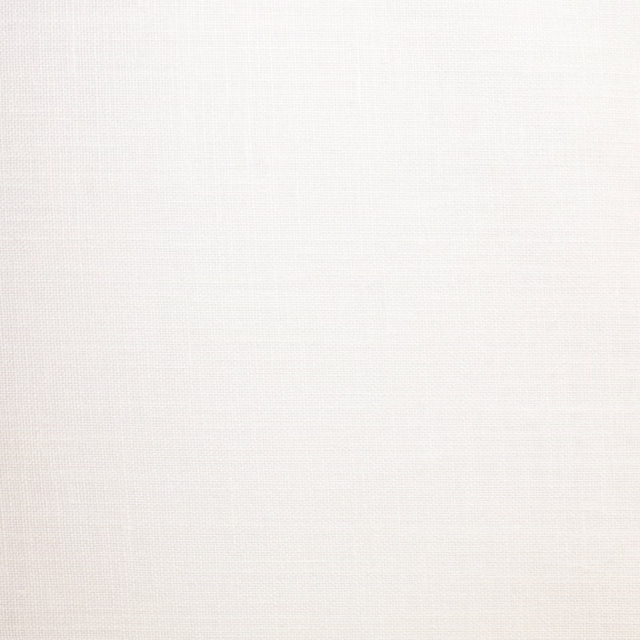 Soft warm white sheer fabric with a barely visible fine woven grid