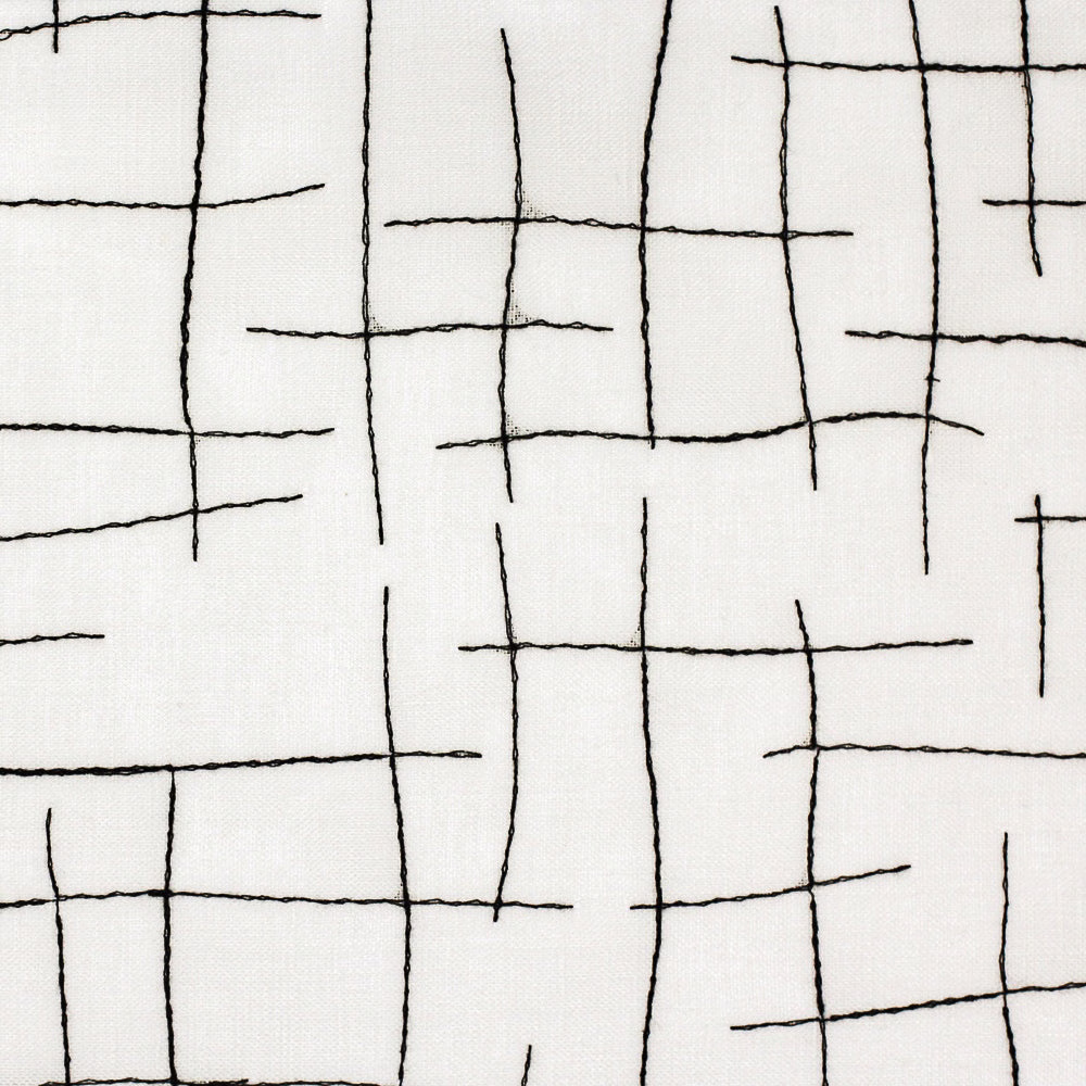 Off-white sheer with irregular black hand-drawn grid lines and fine texture