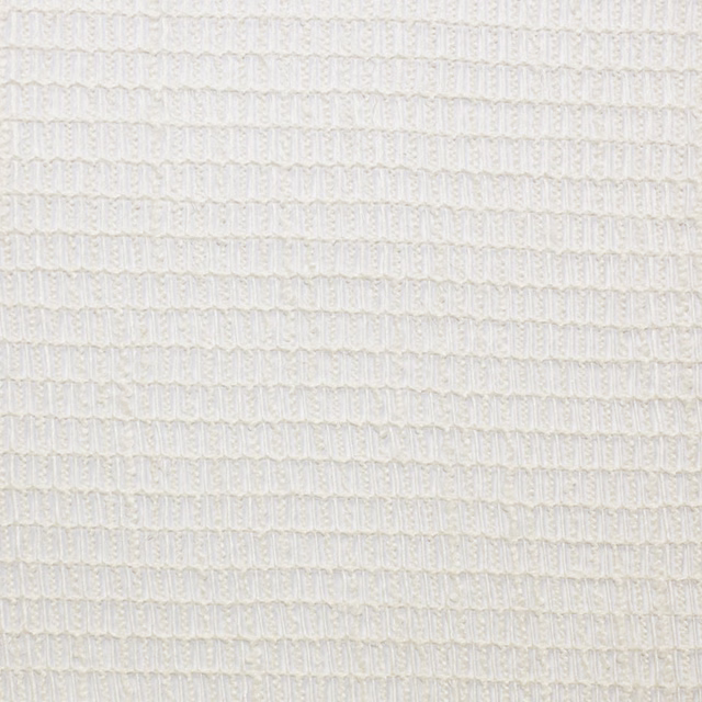 Close-up of off-white Isla 02 showing fine ribbed, looped woven texture