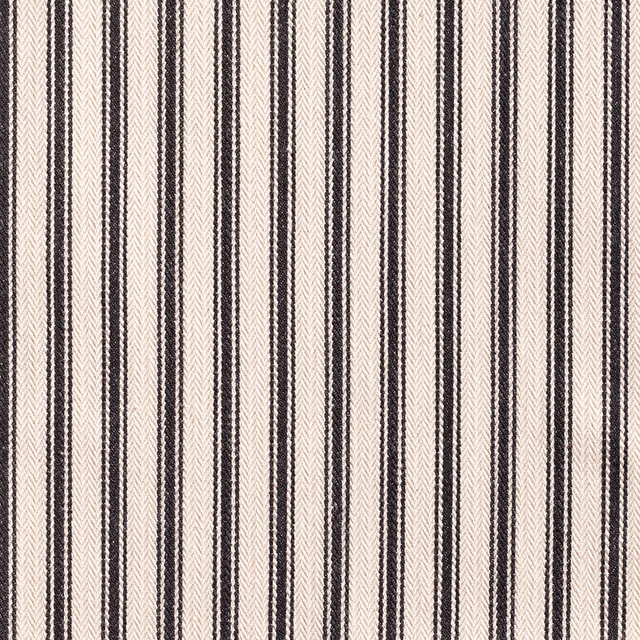Warm cream woven ticking with narrow black vertical stripes and textured edges