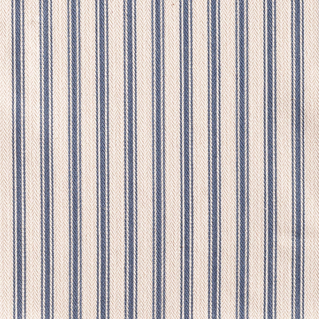 Close-up of muted blue and cream woven ticking stripes with fine vertical texture