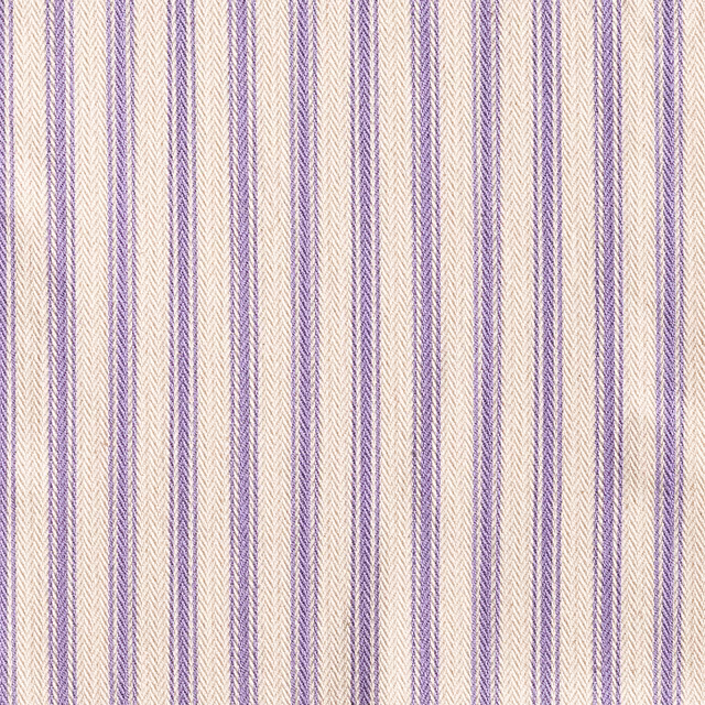 Ivory woven ticking with slim violet stripes and chevron-textured bands