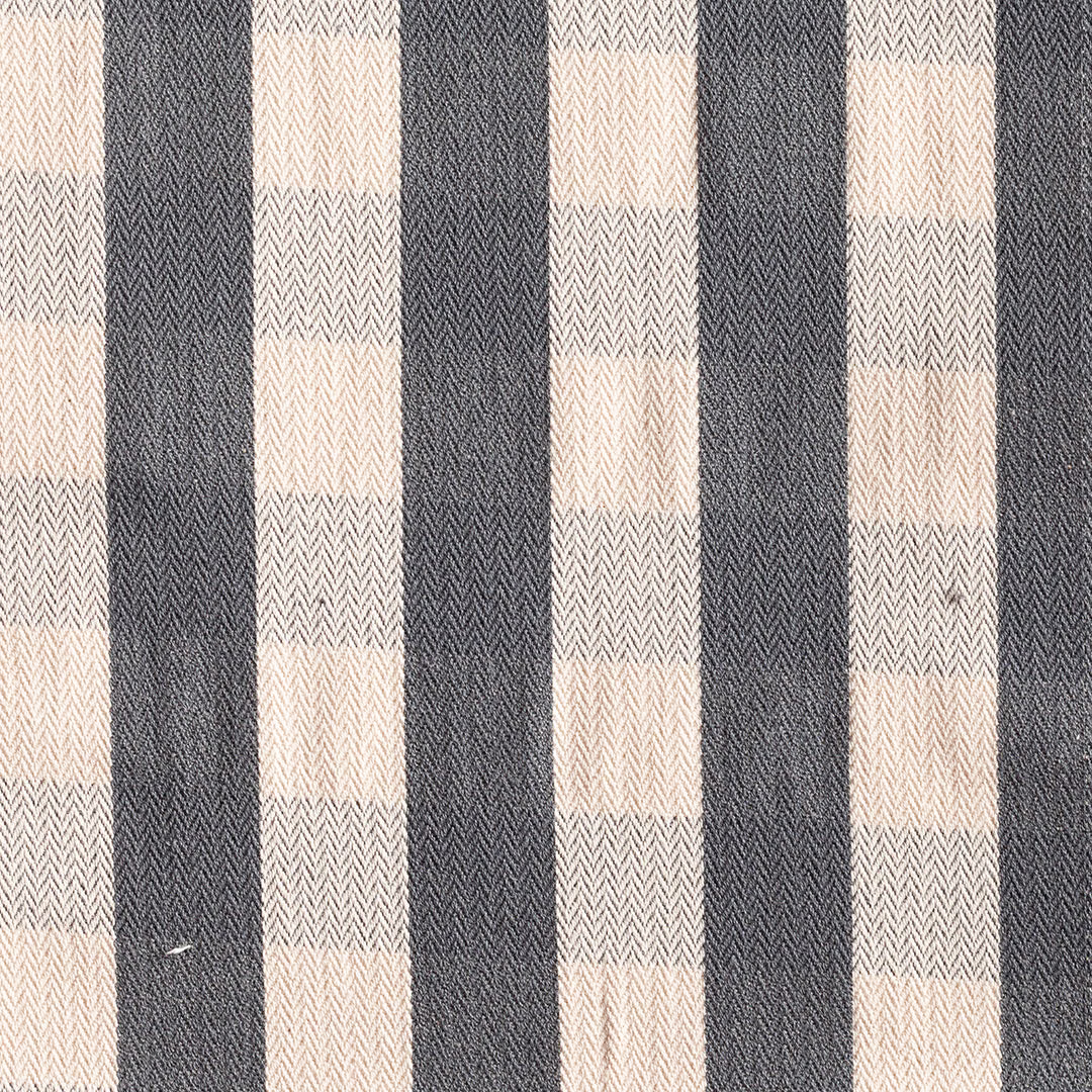Charcoal and ivory checked fabric with a fine herringbone weave