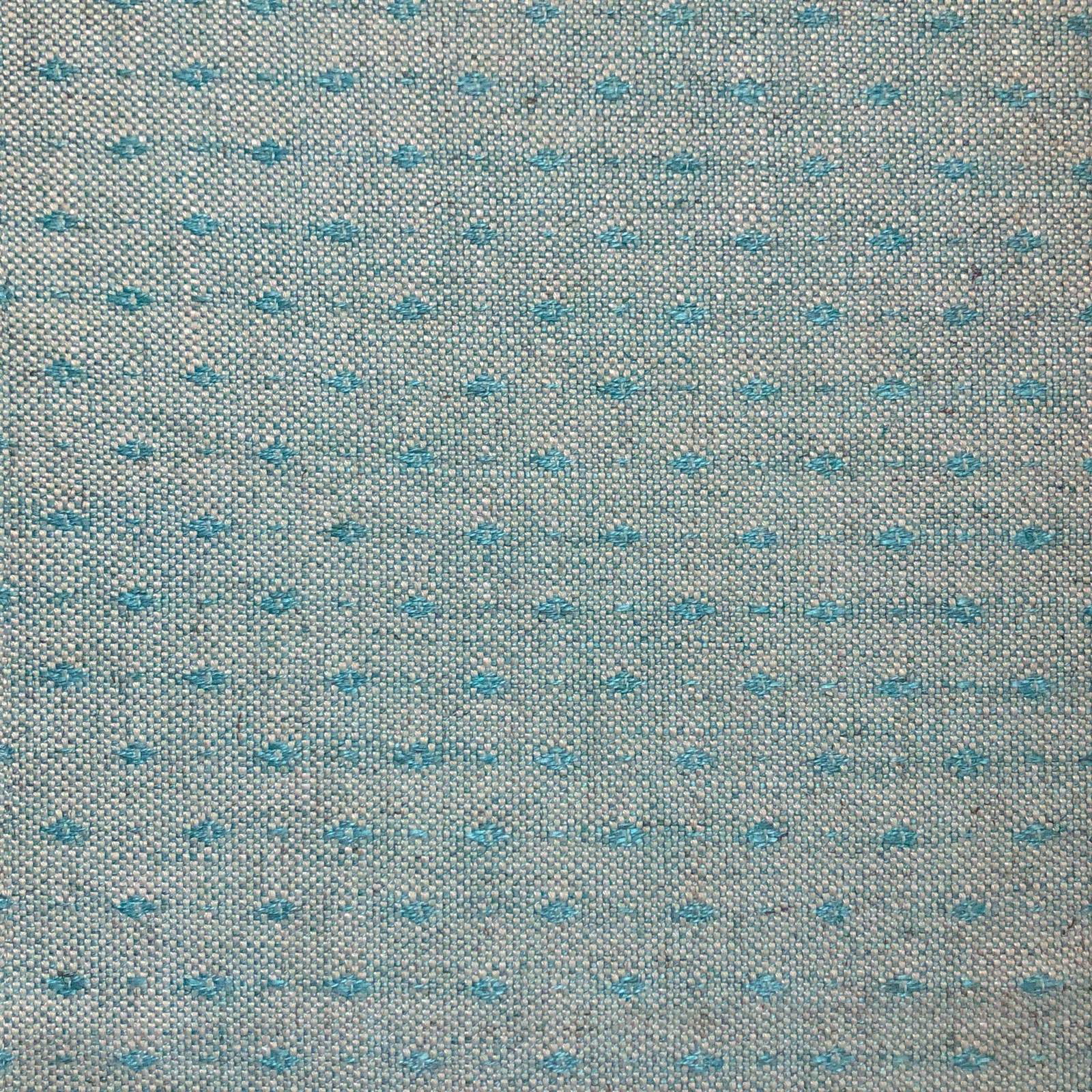 Grey-beige woven ground with scattered turquoise dash motifs