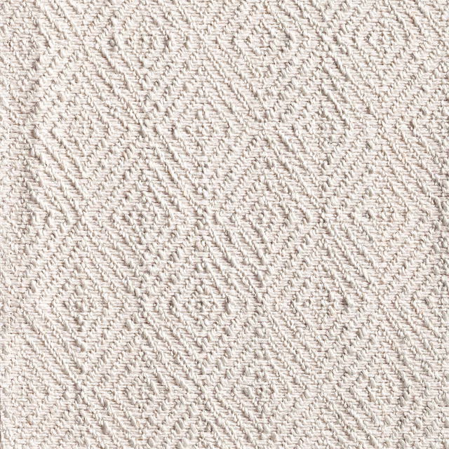 Pale elephant-grey textile with raised diagonal chevron lines and a softly nubby weave