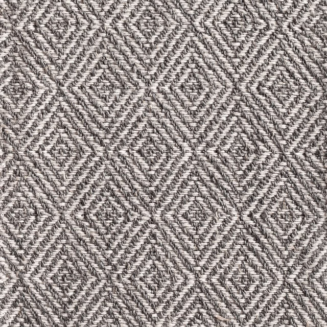 Cool grey and cream woven fabric with repeating textured diamond motifs