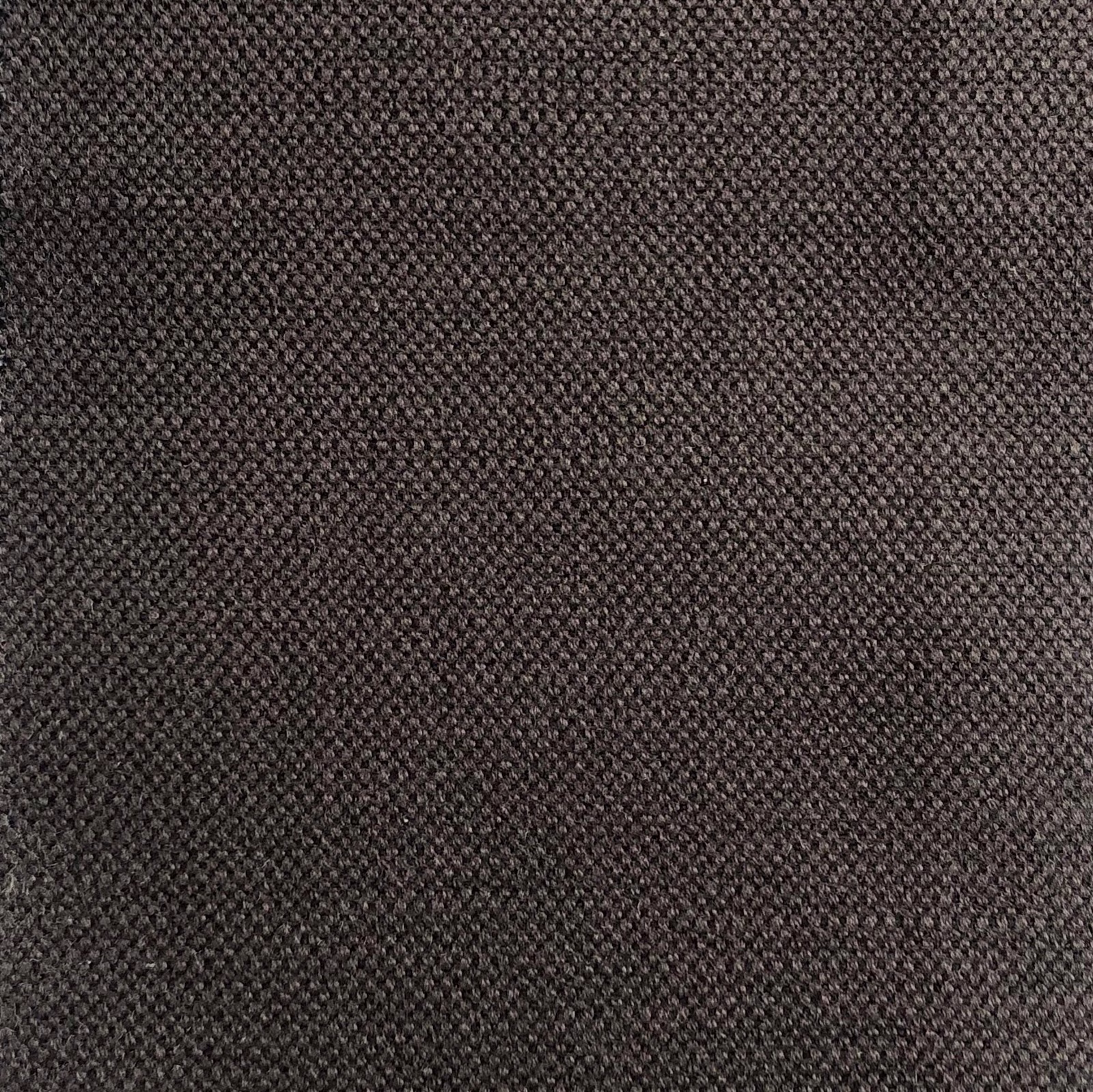 Deep charcoal-brown textile with a dense, finely flecked woven surface
