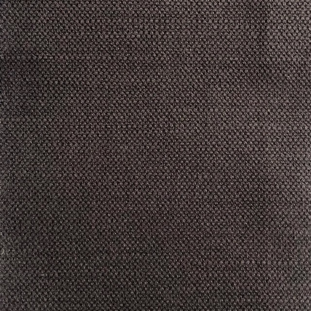 Deep charcoal-brown textile with a dense, finely flecked woven surface