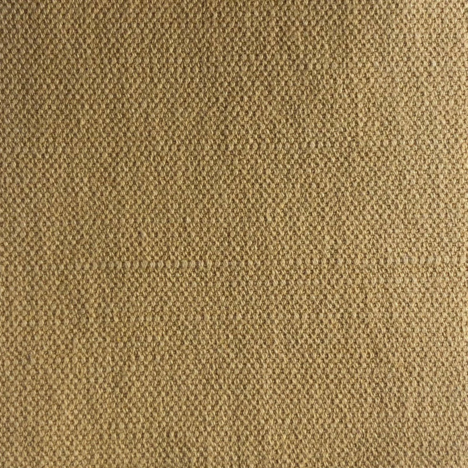 Close-up of warm camel beige fabric with a dense, small-scale textured weave