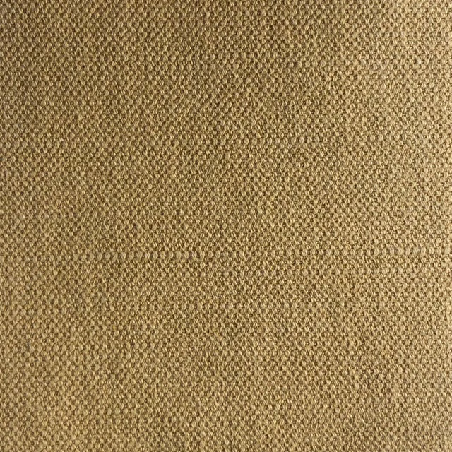 Close-up of warm camel beige fabric with a dense, small-scale textured weave