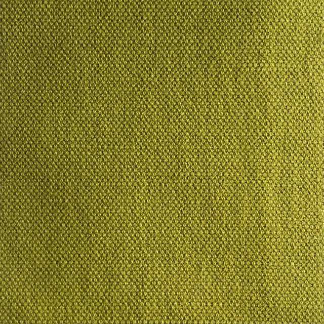 Close-up of Duo 113’s yellowed olive green, tightly textured woven surface