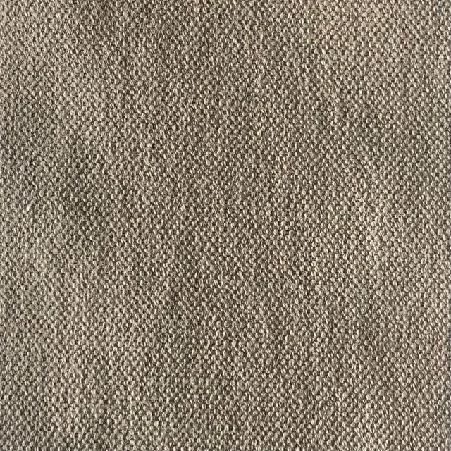 Mottled taupe-grey textile showing a close, nubby woven surface
