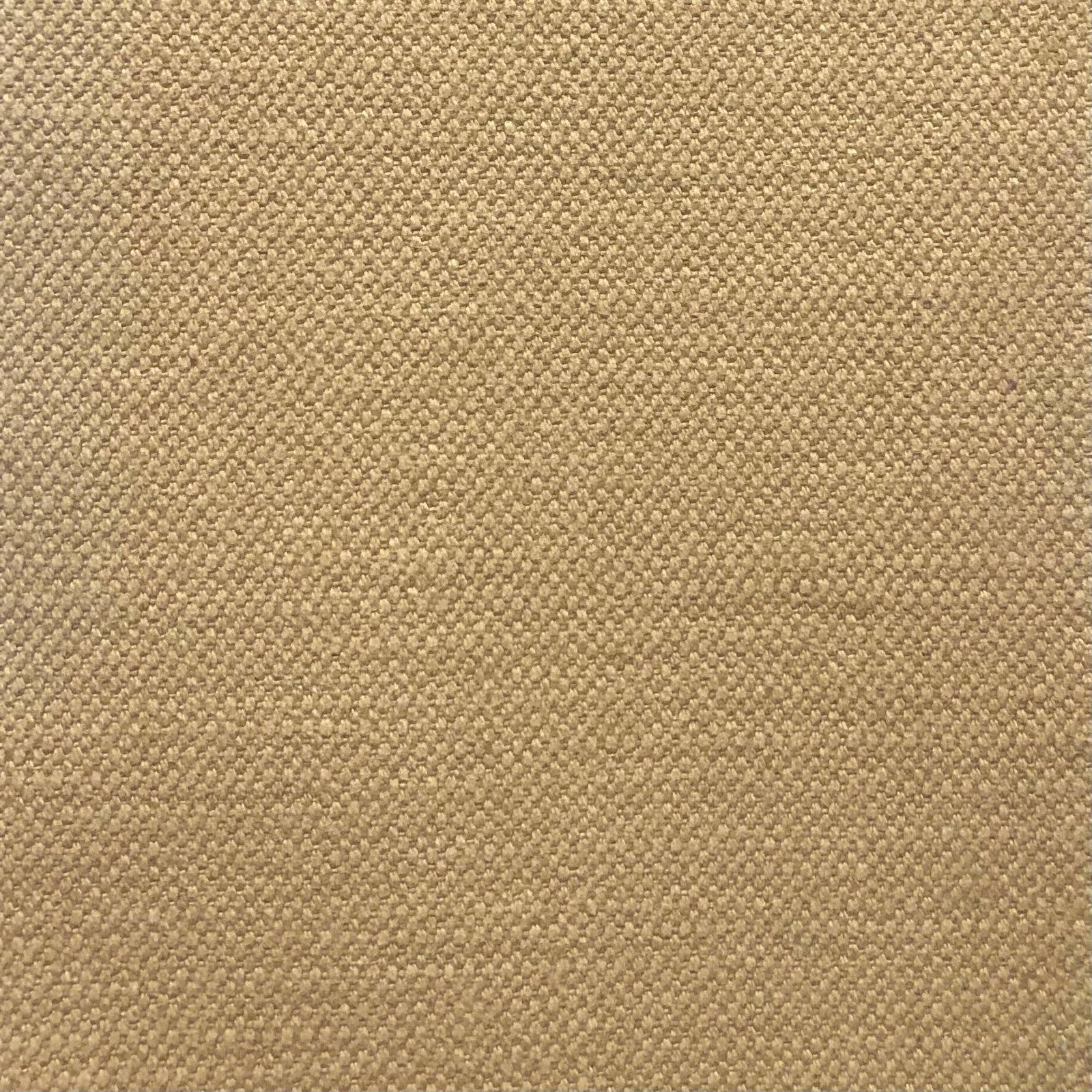 Warm camel-beige fabric showing a close, finely pebbled woven texture