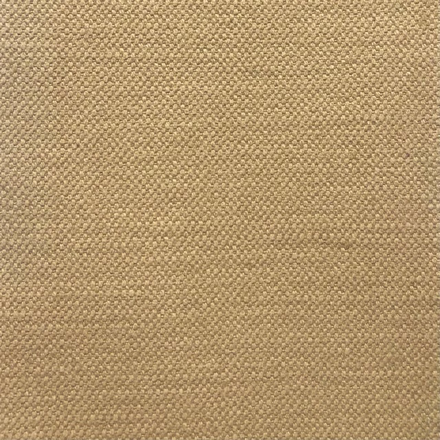 Warm camel-beige fabric showing a close, finely pebbled woven texture