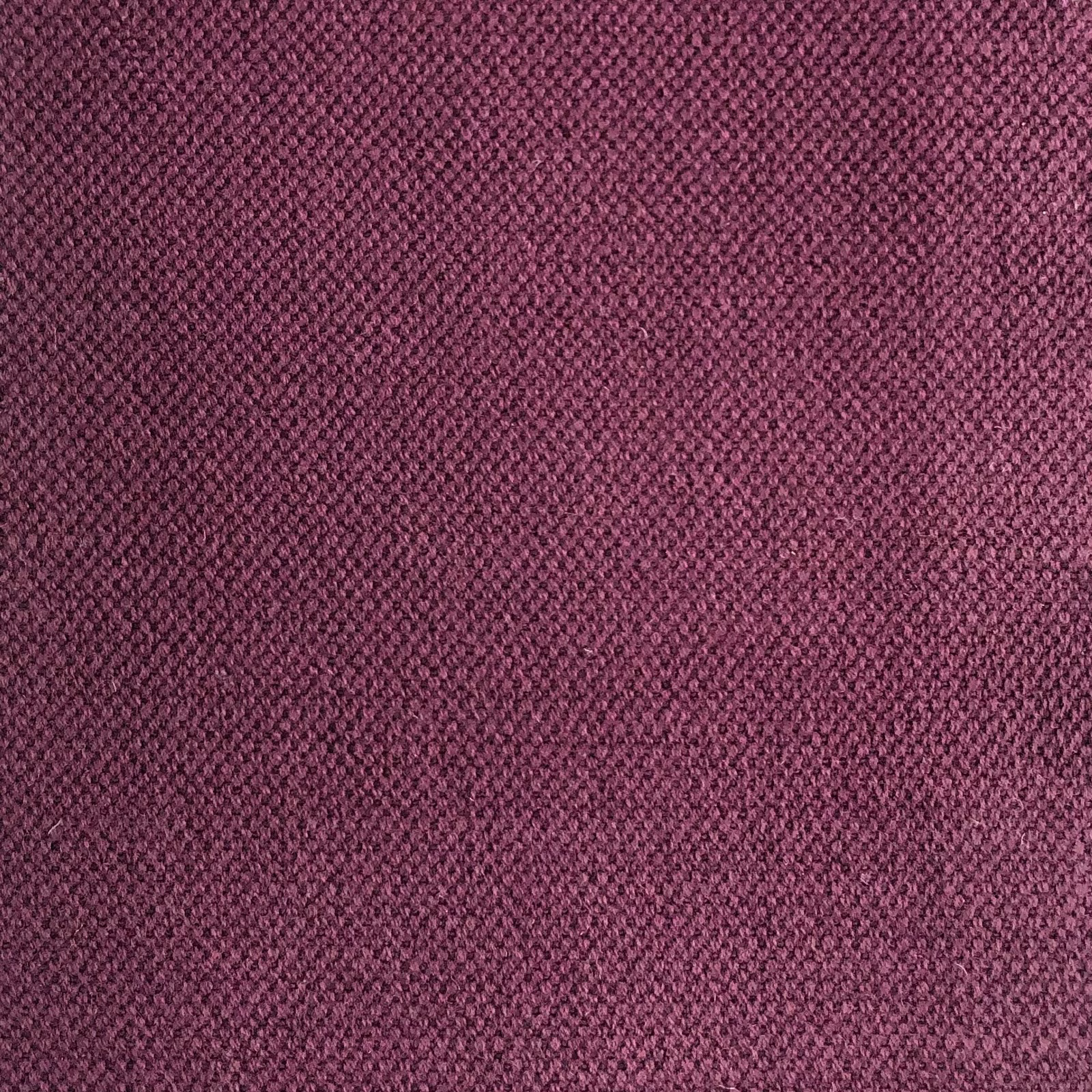 Close view of Duo 169’s muted plum-purple, finely pebbled woven texture