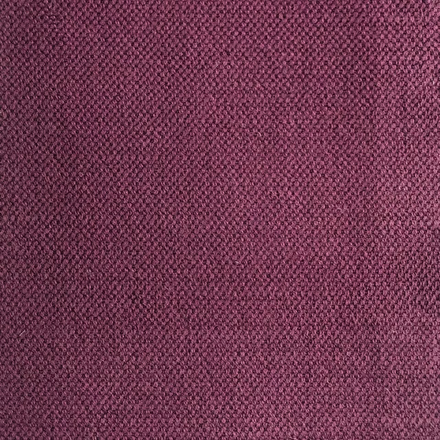 Close view of Duo 169’s muted plum-purple, finely pebbled woven texture