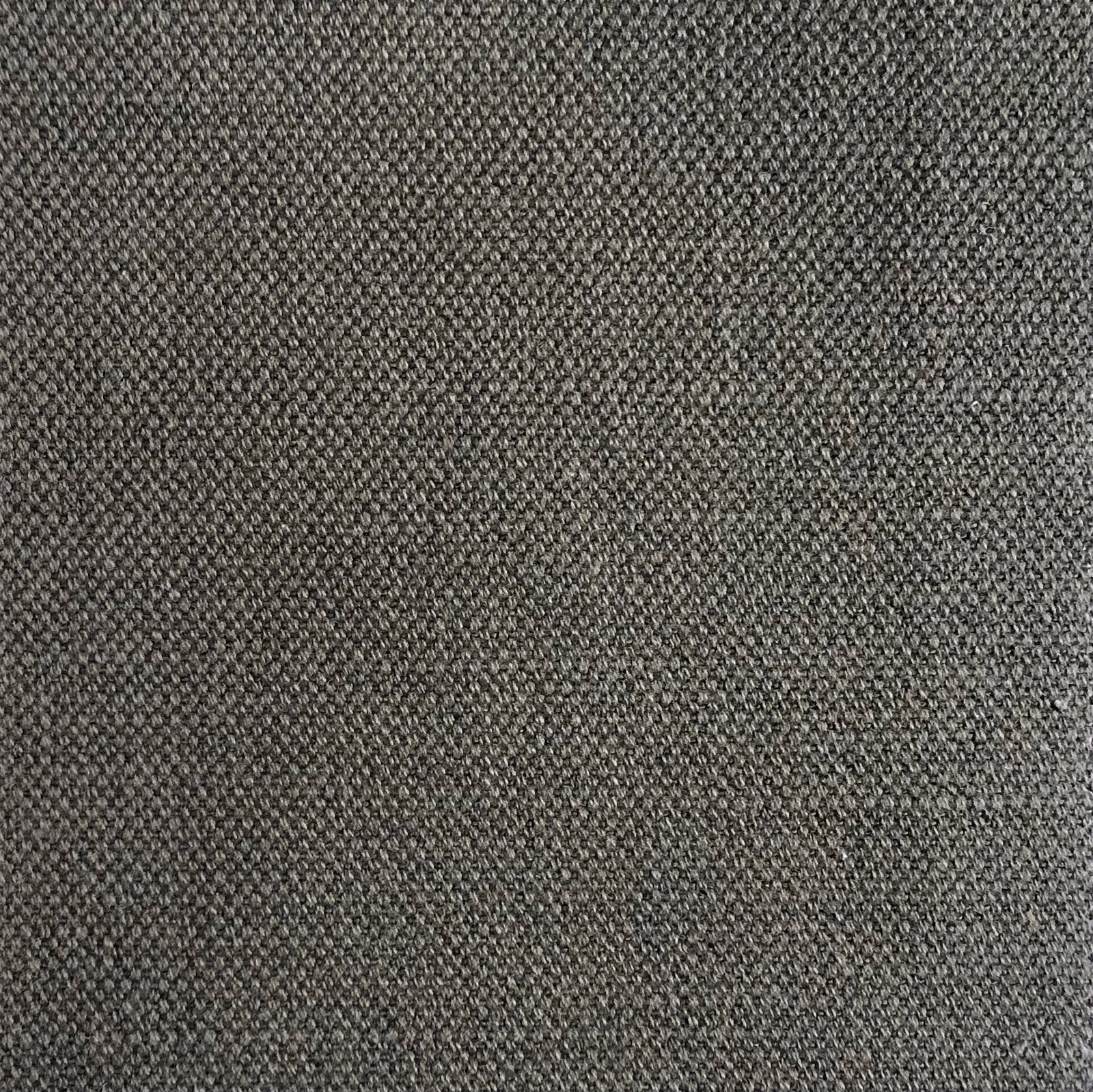 Close view of charcoal-grey woven fabric with fine peppered texture and lighter flecks