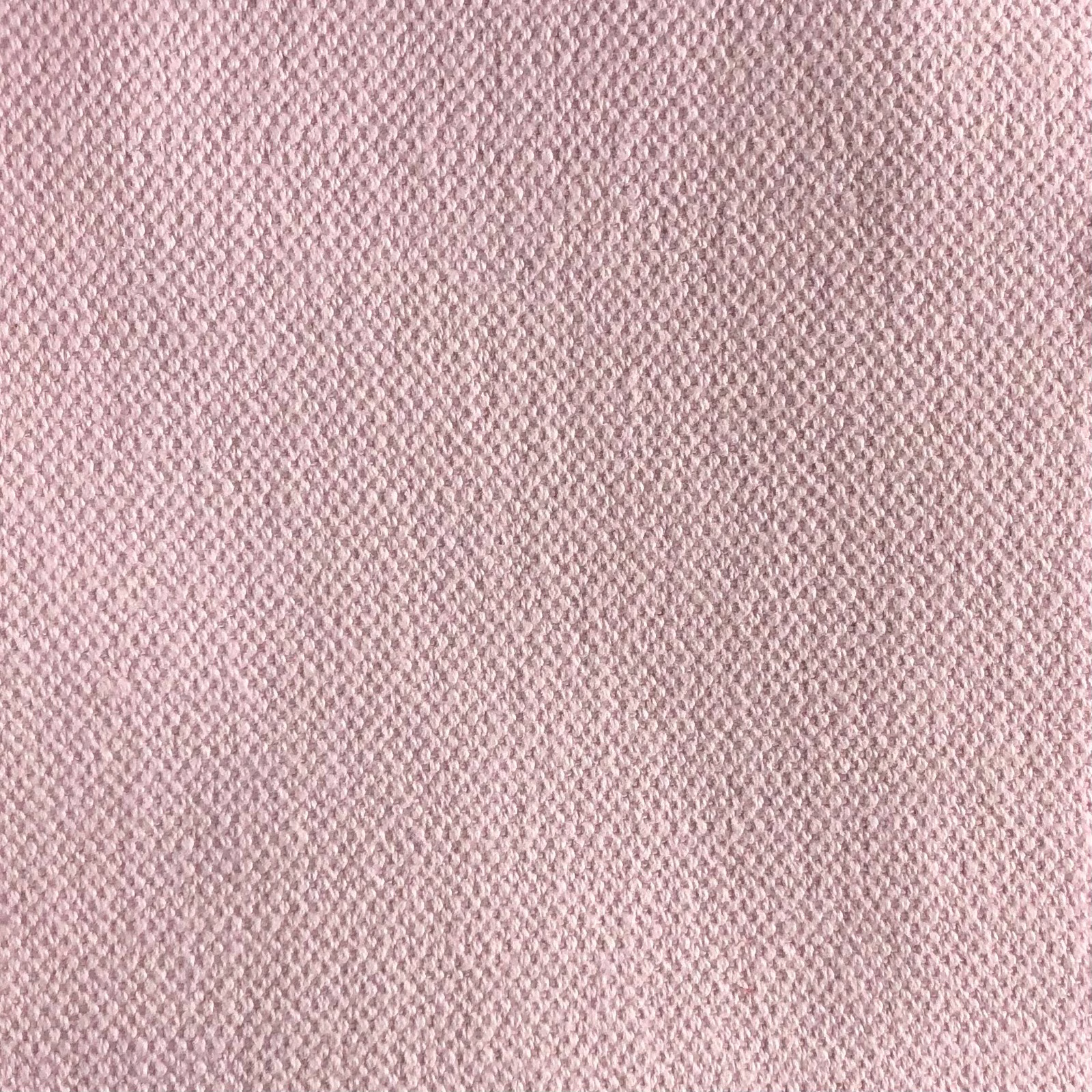 Dusty blush-pink woven swatch with a fine flecked, softly textured surface
