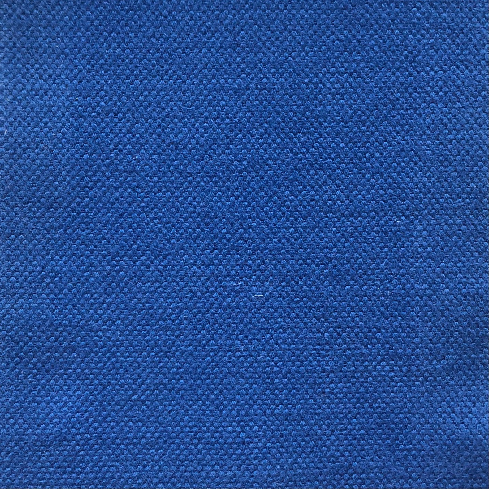 Close-up of Duo 184 in rich cobalt blue with a dense pebbled weave