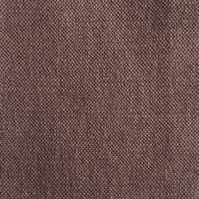 Close view of muted cocoa-brown fabric with a dense, softly flecked weave