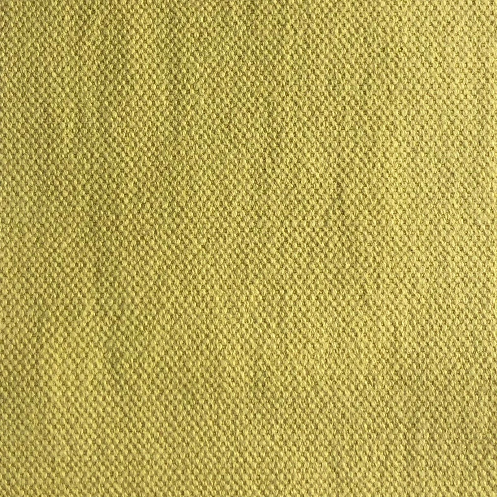 Close-up of Duo 205’s muted olive-yellow woven texture with fine pebbled detail