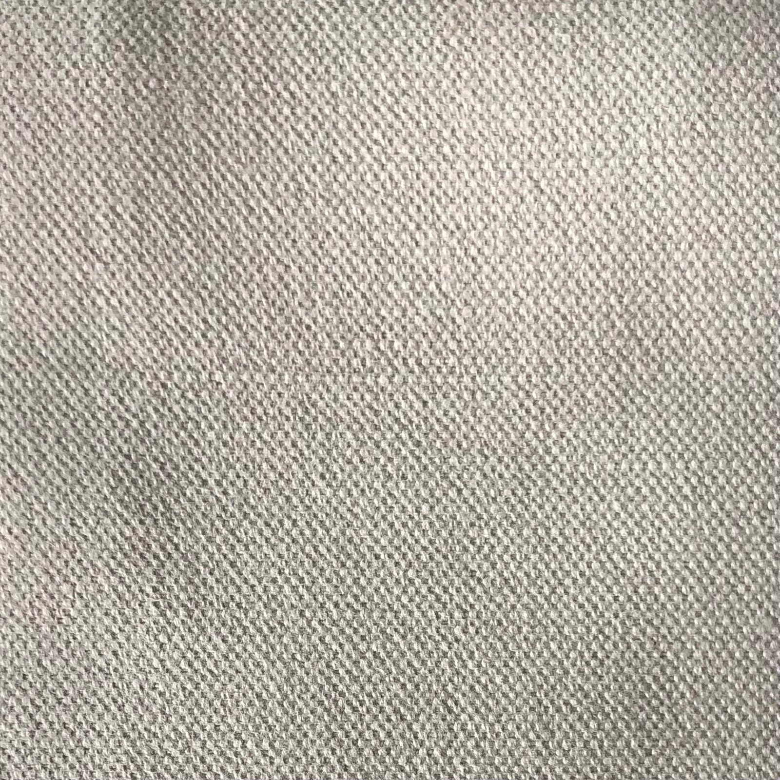 Warm greige fabric with a fine, tightly woven, subtly pebbled surface